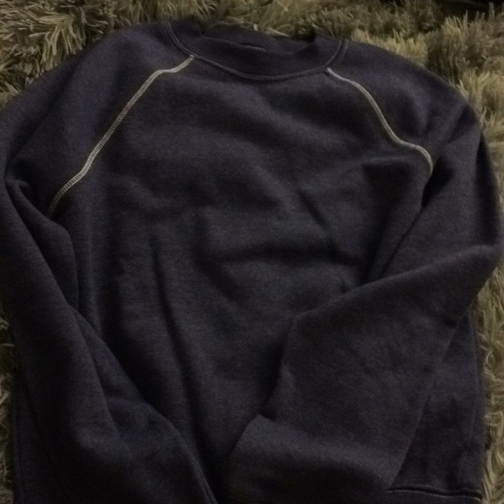 Blue sweatshirt.